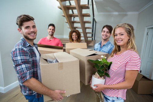 Professional office relocation team organizing workspaces